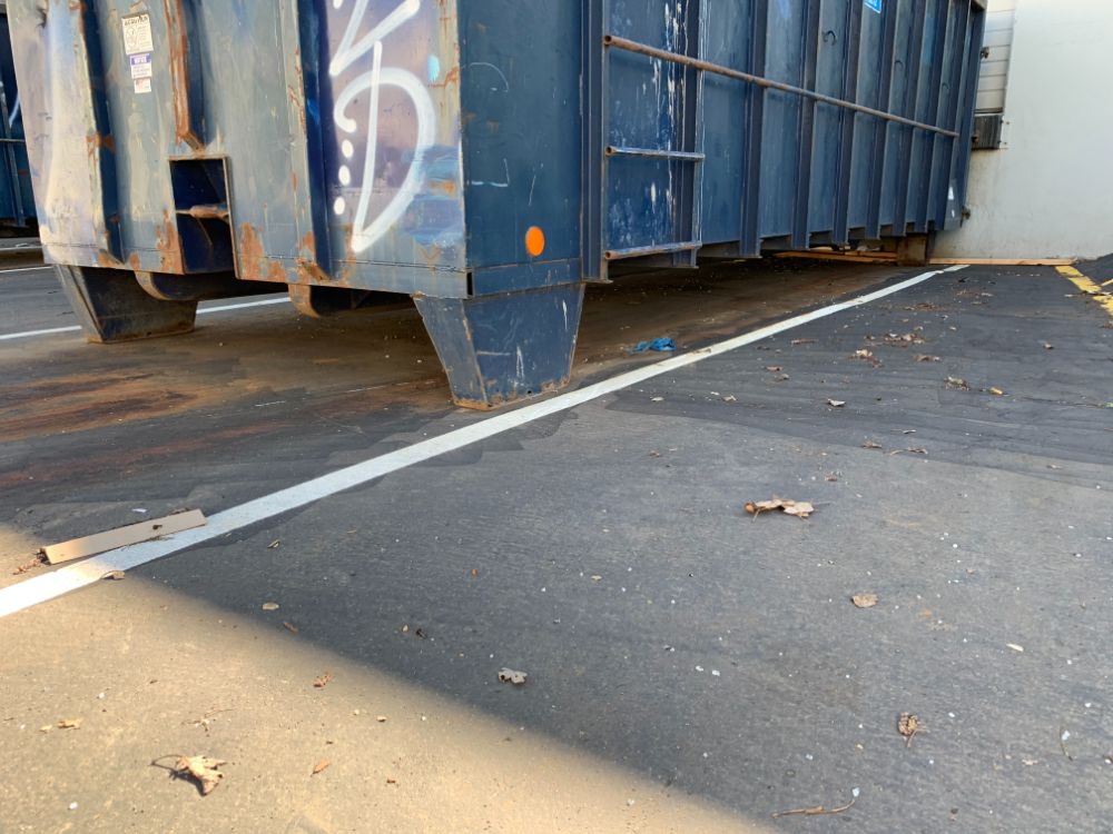 Riverside commercial dumpster pad cleaning